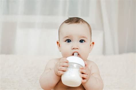 Baby Spitting Up Causes And Solutions New Parenting Guide