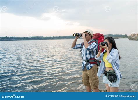 Adventurous Couple Stock Photo Image Of Lake Camera 67190568