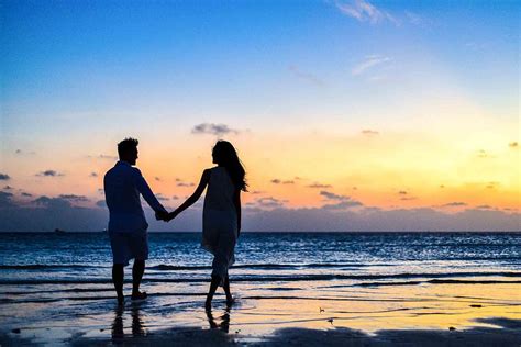 Hd Wallpaper Man And Woman Holding Hands Walking On Seashore During Sunrise Wallpaper Flare