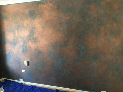 Apply antique paint using the special brush in short strokes to different directions. How to Paint a Faux Copper Feature Wall DIY | Hometalk