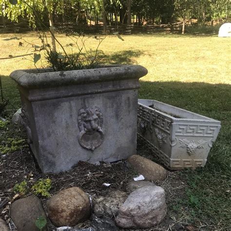 Lot 108 - Two Large Cement Planters | EstateSales.org