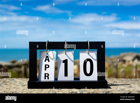 Apr 10 Calendar Date Text On Wooden Frame With Blurred Background Of