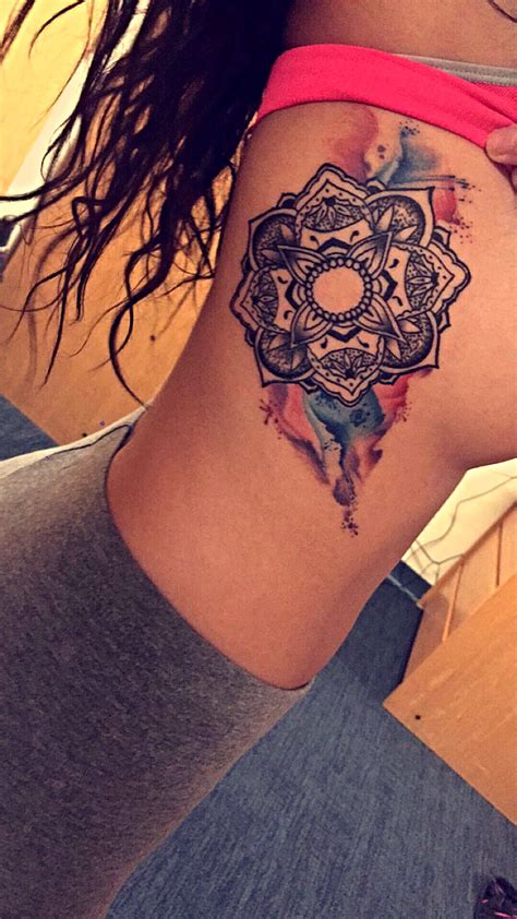 Geometric mandala tattoos are my favorite because they show geometrical symmetry all around like this. Mandala lotus flower water color tattoo ribs (With images ...