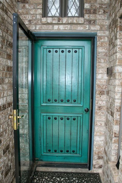When done right, front doors are welcoming, and add a hit of colour and style. Distressed turquoise front door | Blue Doors | Pinterest