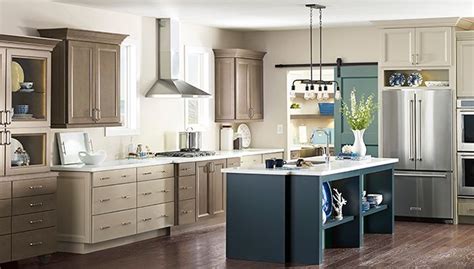 An improved layout and white cabinets and appliances create a pretty and practical design in a compact space. Kitchen Planning Guide: Layout and Design