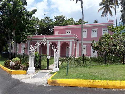 Pink House With White Gate In Puerto Rico