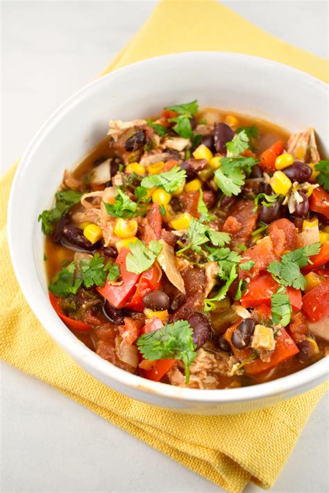 This crockpot chicken taco soup comes together in a matter of minutes, is healthy, gluten free, and full of veggies, lean chicken, plenty of texture, and loads of spices! Crock Pot Chicken Taco Chili Recipe - 0 Points - LaaLoosh