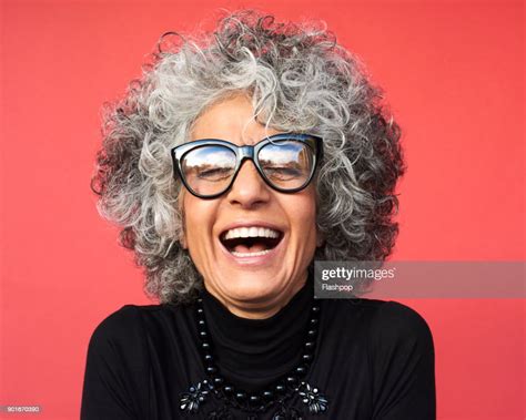 Portrait Of Mature Woman Laughing Photo Getty Images