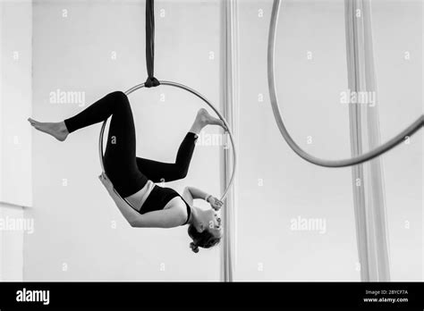 A Colombian Aerial Dancer Performs On Aerial Hoop During A Training Session In A Gym In Medellín