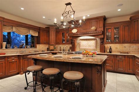 Rustic rough cut stone surrounds the large gas stove. Old World Wood-Mode Kitchen with Large Cooking Hearth by Mario Mulea - Kitchen Designs by Ken ...