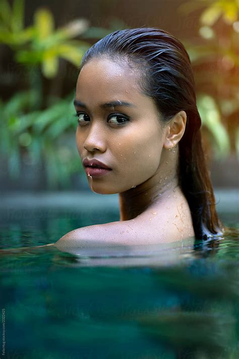 A Head And Shoulder Portraiture Of A Balinese Woman In Her Pool By