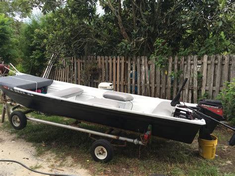 14 Ft Fiberglass Flat Bottom Boat With 15 Hp Gamefisher And 55 Lbs