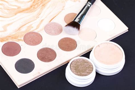 Eye Shadow Palette In Natural Colours And Makeup Brushes Stock Photo