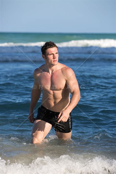 Good Looking Shirtless Toned Man At The Beach Rob Lang Images