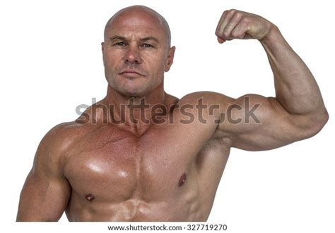 Portrait Muscular Man Flexing Bicep Against Stock Photo 327719270