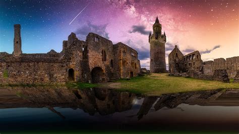 Fortress Castle With Reflection On Water Under Starry Sky During
