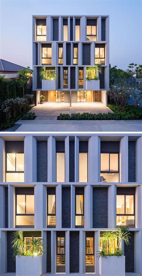 The Facade Of These Townhouses Have Set Back Windows So That The