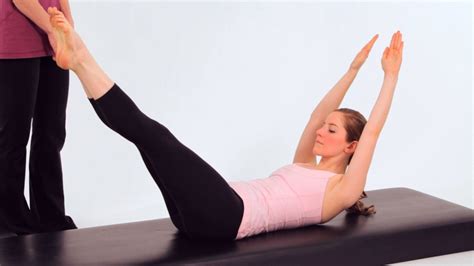 How To Do A Double Leg Stretch In Pilates Howcast