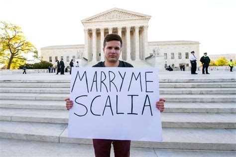 Both Sides Of The Same Sex Marriage Case Duel With Signs And Slogans