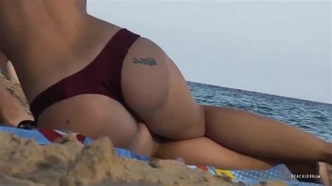 Nice Big Implants On This Girl Relaxing In The Sand Alpha Porno
