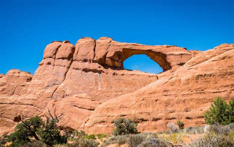Stone Sandstone Cliffs And Natural Arches In The Arches National Park