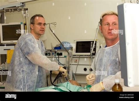 Doctors Perform An Endoscopic Examination On A Patient Stock Photo Alamy