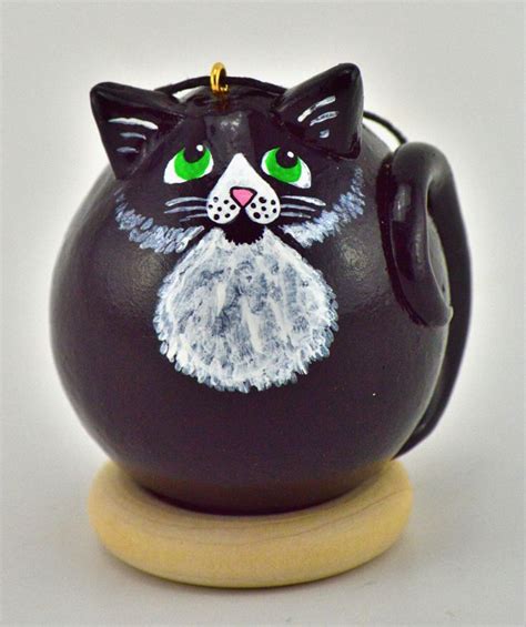 In fact, one particularly great way to choose between all the options for grey cat names is to closely study your feline sidekick's unique coat color. Tuxedo Cat Egg gourd ornament Gourdament Black and white ...