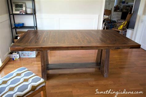 Well, that is what the dining table is for, besides eating. DIY Rustic Dining Table