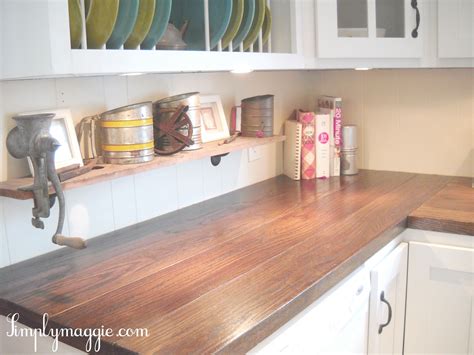 In between working on my bedroom, building a porch & all the other 89 projects i have going on around here, i'm slowly working on sprucing up my kitchen a bit by adding some new diy wood countertops. Country Kitchen Remodel | simplymaggie.com | Butcher block ...