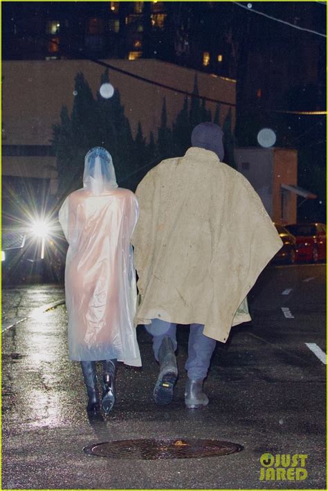 Kanye Wests Wife Bianca Censori Braves The Rain In See Through Poncho