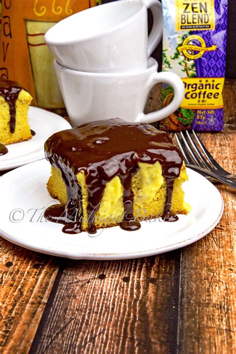 If you do this before the pudding has completely set, the custard can drip all the way down into the pockets. Boston Cream Poke Cake - The Midnight Baker