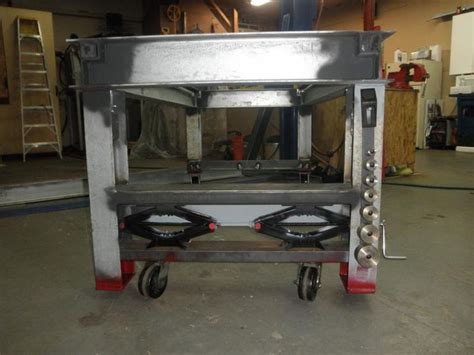 Ideally they'd be lever operated or some mechanism to. Heavy welding bench, with scissor jacks moving retractable wheels. ingenuity! Welding Table ...