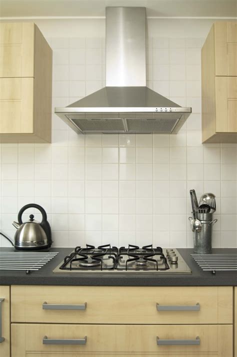 A kitchen hood, exhaust hood, or range hood is a device containing a mechanical fan that hangs above the stove or cooktop in the kitchen. What Height to Put a Range Hood? | Hunker