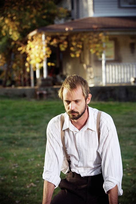 A Man Sitting On A Tree Stump Photograph By Ron Koeberer Fine Art America