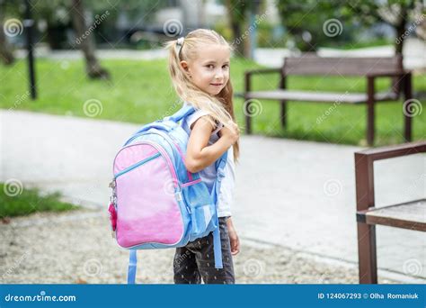 Little Girl With A School Backpack The Concept Of School Study