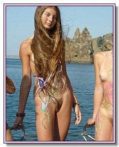 Undressed Nice Girls Admires Itself On A Nudist Beach