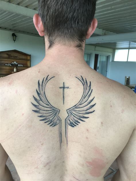 Valkyrie Wings And Cross Viking Tattoos Wings Tattoo Norse Tattoo