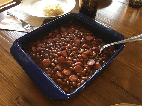 Plump beans stewed in hearty tomato sauce with thin slices of chicken franks. BAKED BEANS WITH HOT DOGS - Cooking with Grandma Judy