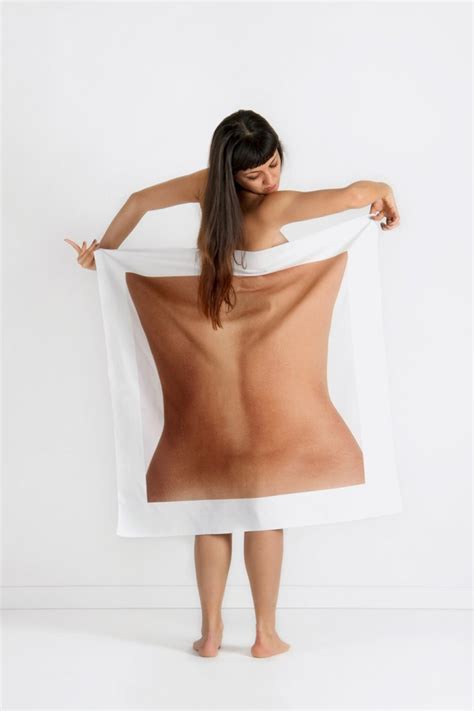 Nude Portraits Of People Holding Pictures Of Enlarged Body Parts