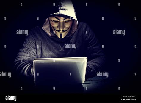 Hacker With Mask At Work Stock Photo Alamy