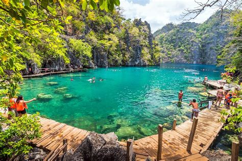 Palawan Philippines People Tourists Swimming At Kayangan Lake In