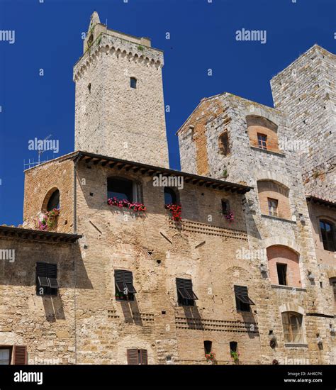 ancient torri degli ardinghelli twin towers in piazza della cisterna palace castle in san