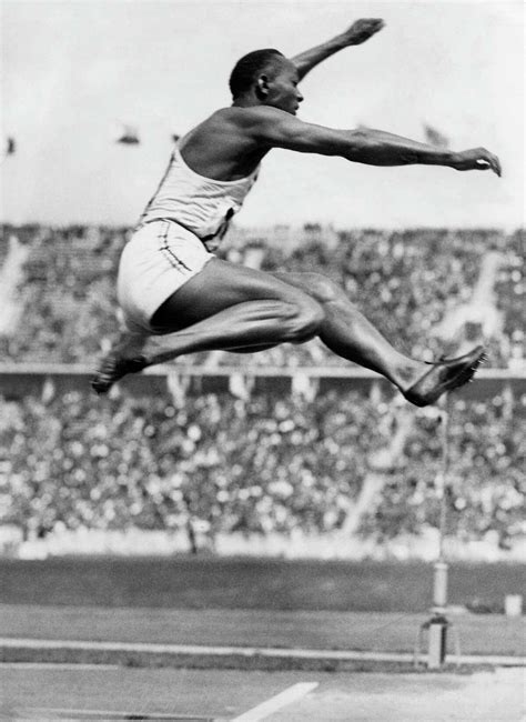 Historic Photos Show Jesse Owens Smashing World Records At Hitlers