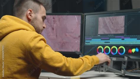 Freelance Videographer Colorist Editing Footage Using Professional