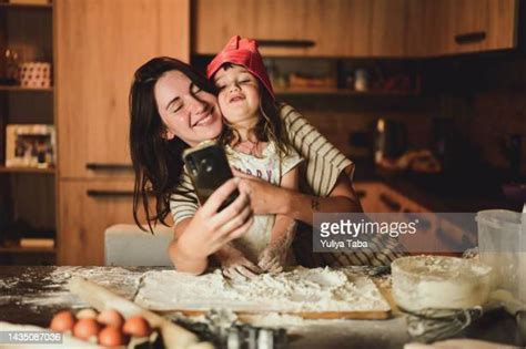 Italian Mother And Daughter In Kitchen Photos And Premium High Res Pictures Getty Images