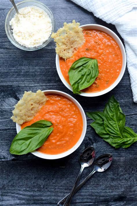 creamy tomato basil soup with parmesan crisps worn slap out