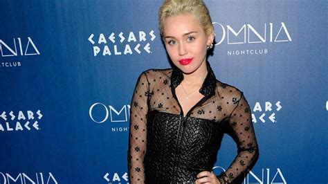 Miley Cyrus Goes Topless While Grabbing Her Crotch In Touch Weekly