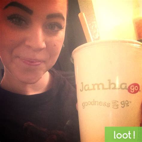 Take A Picture Enjoying A Refreshing Jamba Juice Smoothie At One Of