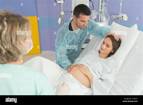 Pregnant Woman Giving Birth In Hospital Stock Photo Alamy