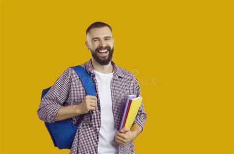 Happy Adult University Student With Books And Backpack Isolated On